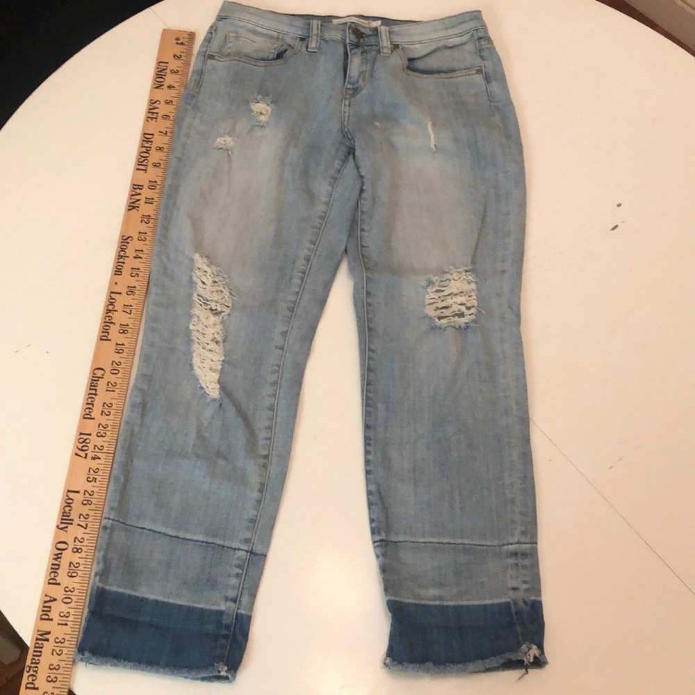 Sexy ripped boyfriend jeans.